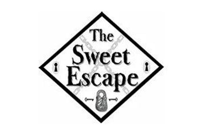 Sweet Escape Sign The Sweet Escape Room